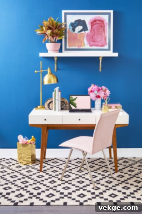 Stylish home office featuring vibrant walls and metallic accent decor