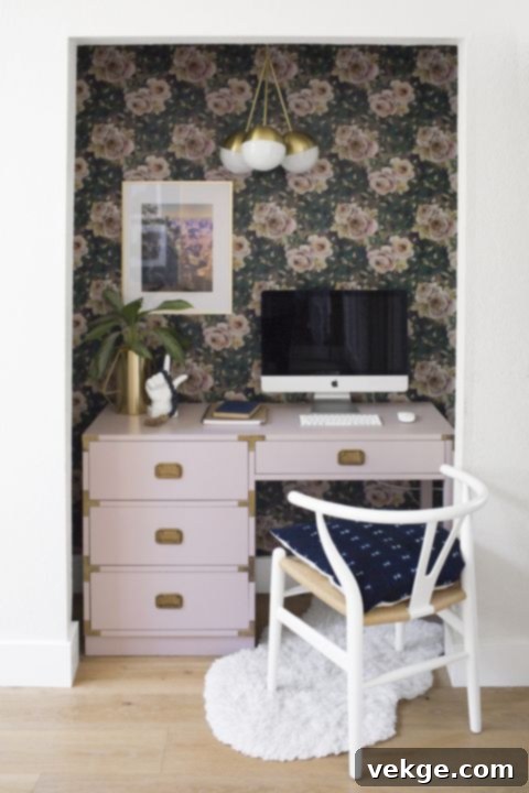 Chic home office with a catchy patterned wallpaper as a backdrop