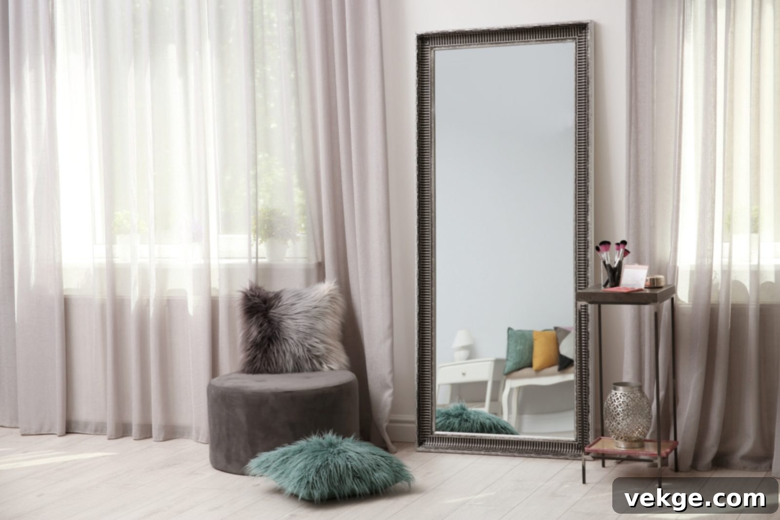 Glamorous living room featuring mirrored furniture and reflective surfaces