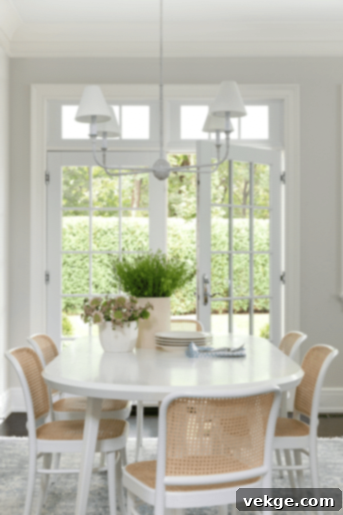 Wooden dining table with green decor touches