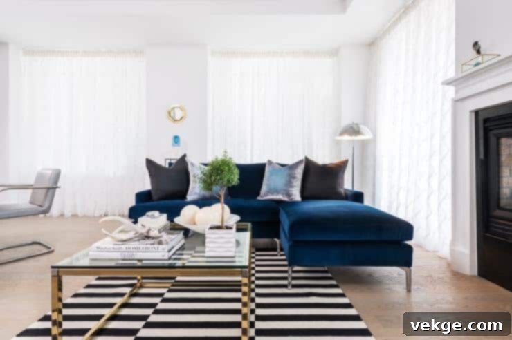 sapphire blue velvet sofa chaise lounge black pillows