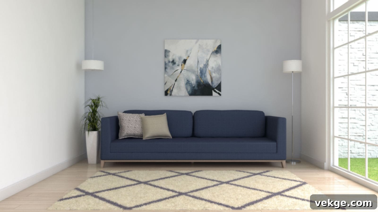 blue couch with cream and blue area rug