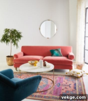 Anthropologie Willoughby Two-Cushion Sofa with scrolled armrests and bun legs