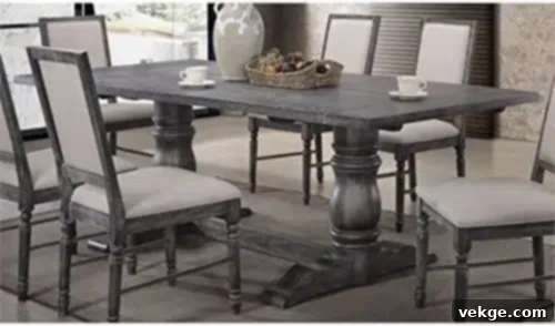 Stylish Weathered Gray Dining Table with Trestle Pedestal