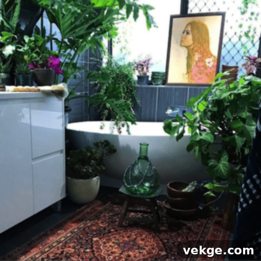Relaxing bohemian bathroom with indoor plants and a globally inspired rug