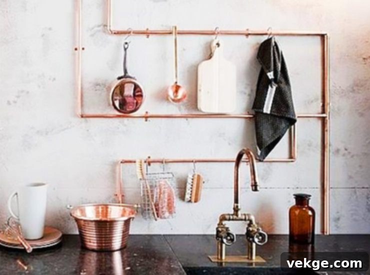 Exposed galvanized pipes used as a wall hanging in an industrial kitchen