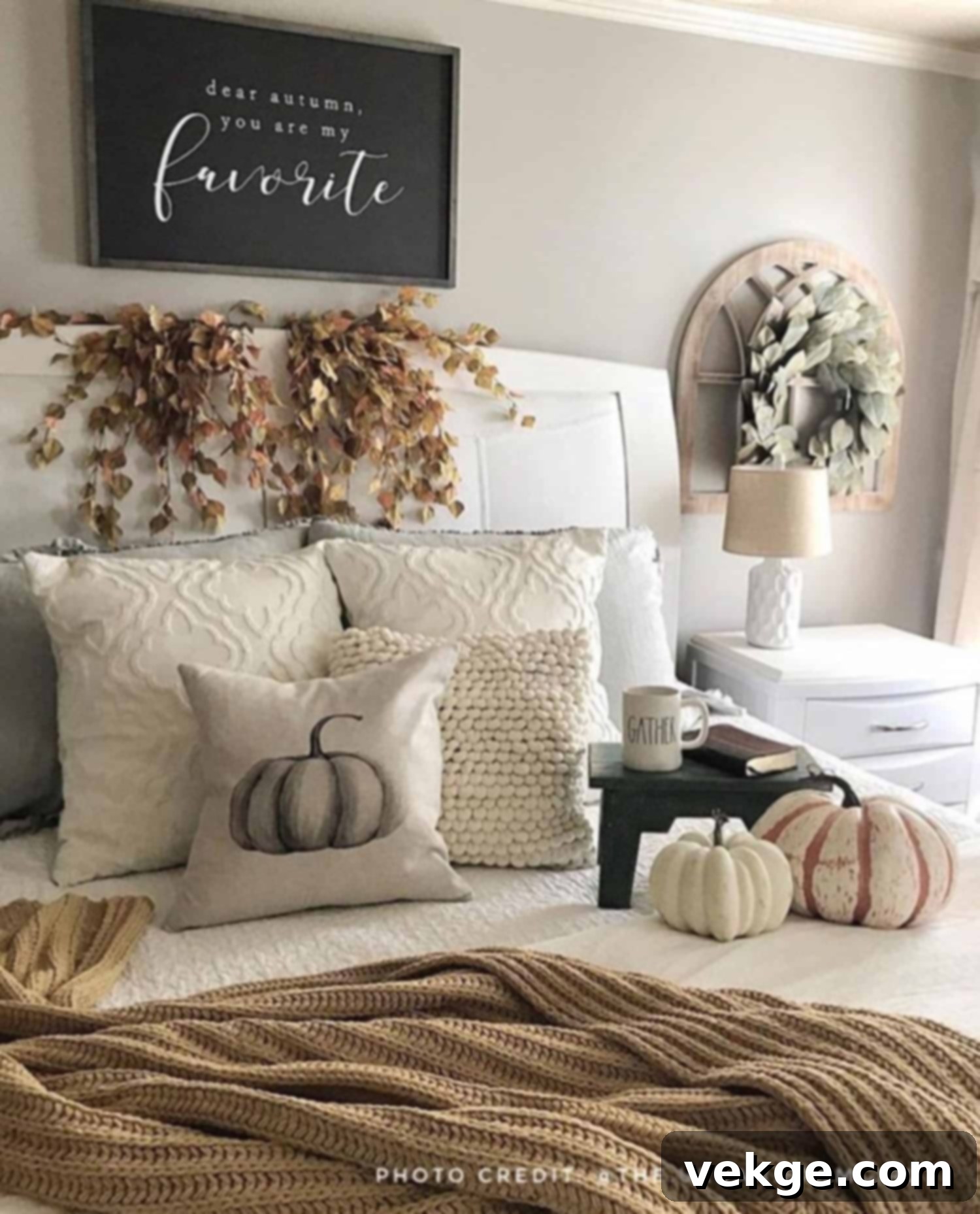 Cozy Farmhouse Fall Decorated Bedroom with textured blankets and pillows