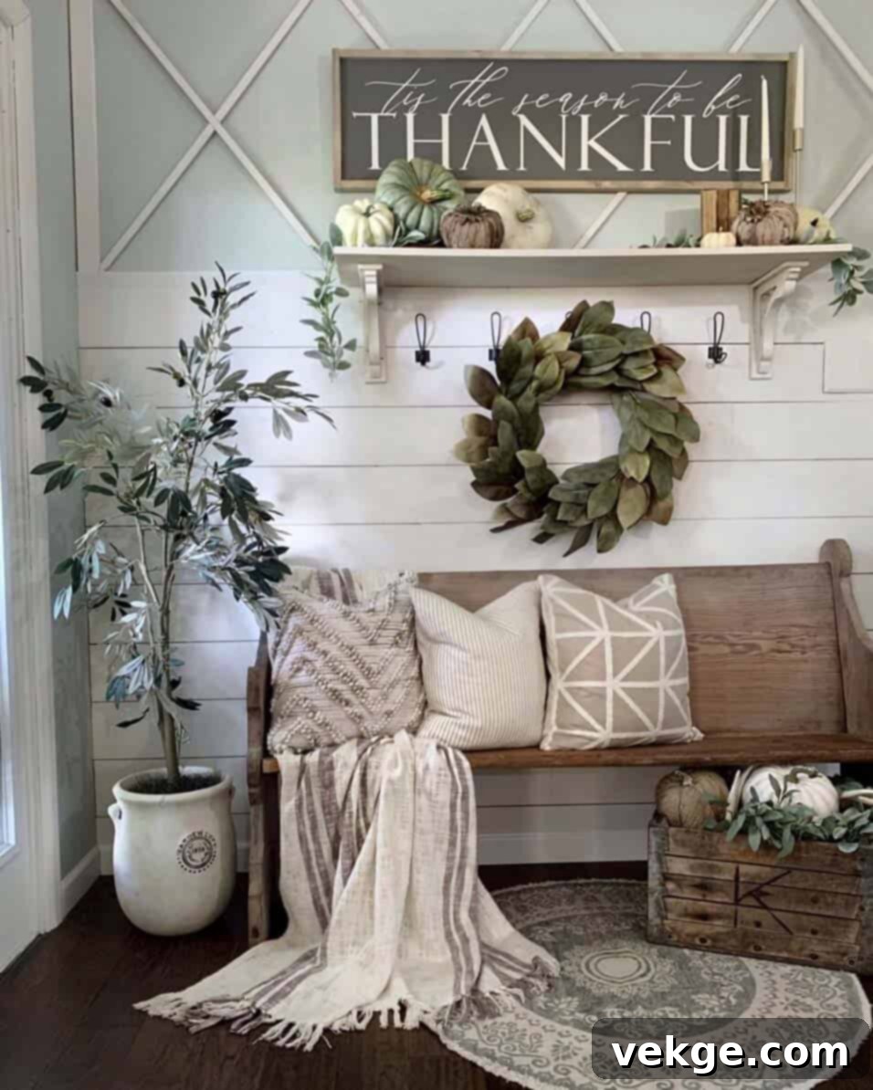 Cozy Farmhouse Fall Decor with a wooden basket of pumpkins and flowers