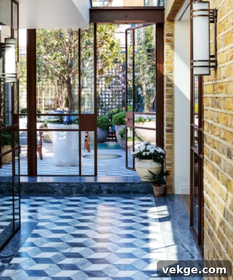 Mid-Century Modern Entryway with Glazed Doors and Marble Flooring