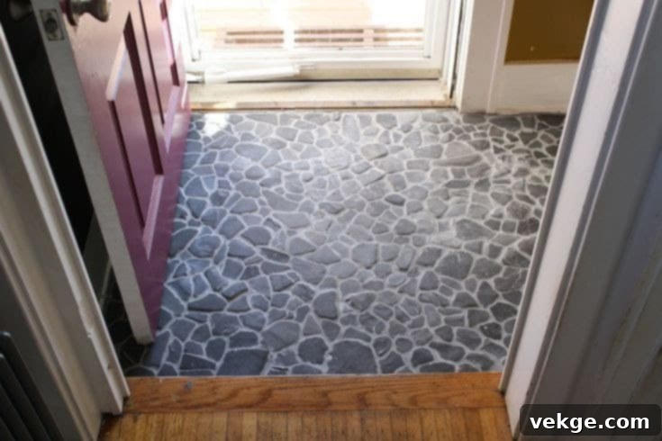 Stone Hallway Tiles in a Mid-Century Modern Entryway