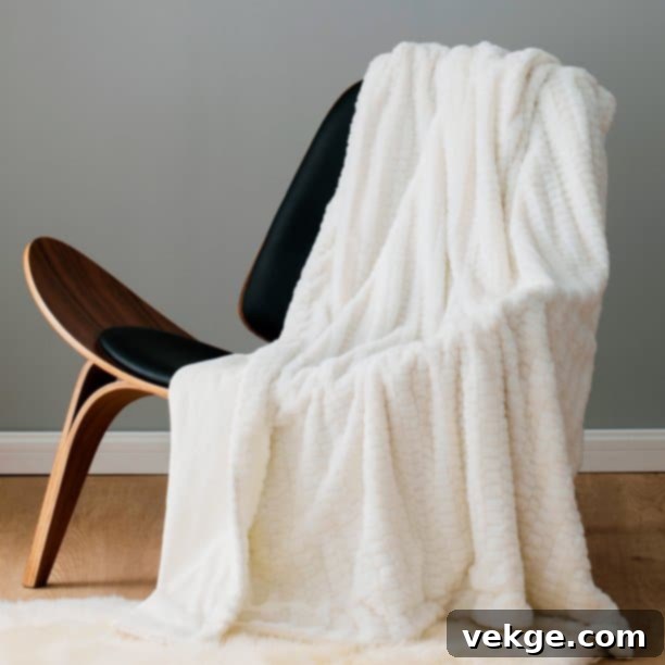 Use Throws to Soften Up Sleek Furniture