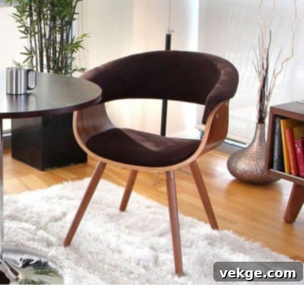 Mod Dining Chair with curvy plywood body and upholstered seat