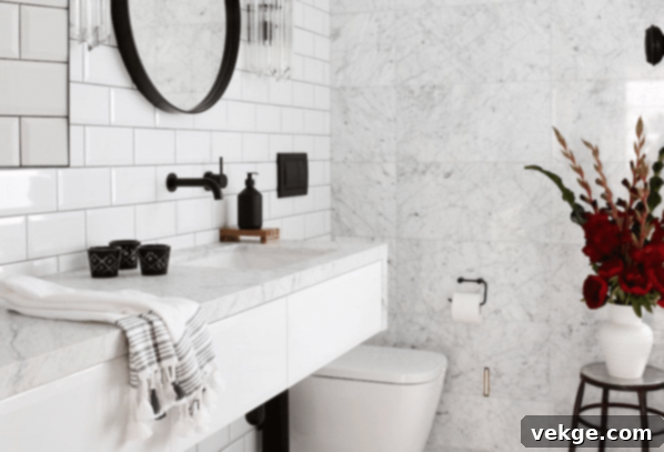 white marble bathroom and black mirror