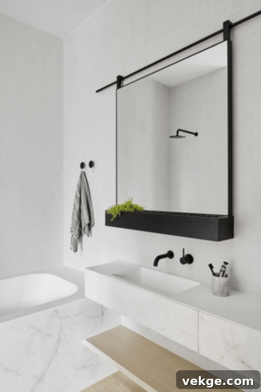 bathroom having black mirror