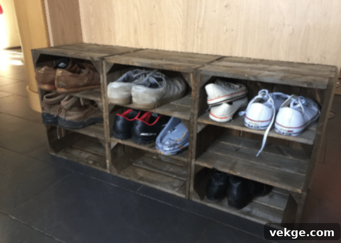 Stacked wooden crates forming a rustic shoe storage unit