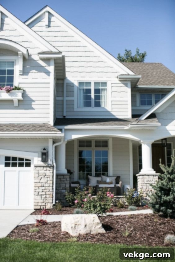 Benjamin Moore Edgecomb Gray as exterior paint enhances curb appeal.
