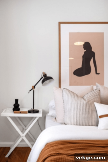 A modern minimalist living room with a neutral color palette, clean lines, and simple furniture.