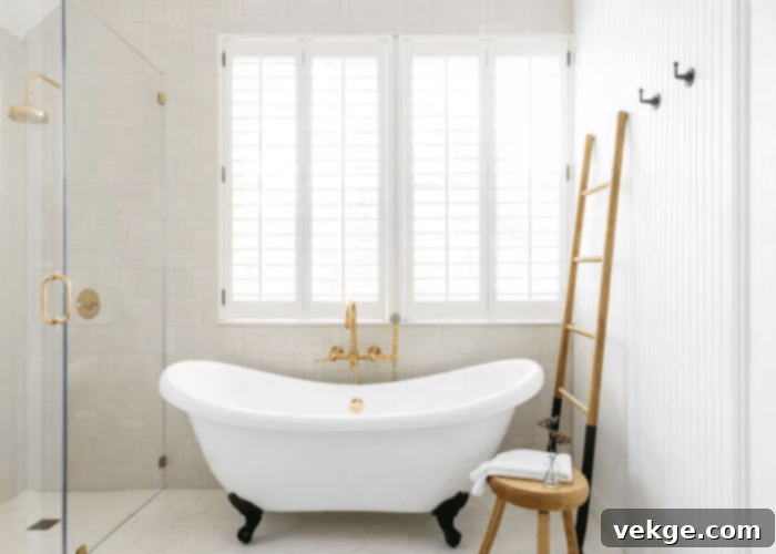 Round or Soft Corner Tub - A classic clawfoot or soft-edge bathtub, central to French Country bathroom design.