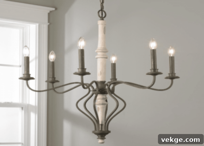 Ceiling Chandelier - A sparkling chandelier as a central light fixture in a French Country bathroom.