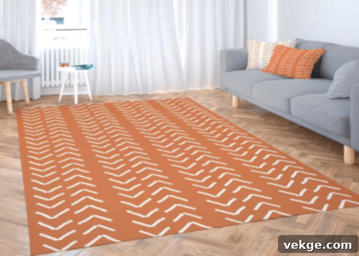 Orange Rug adding warmth to a Light Gray Couch