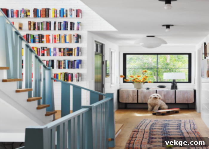 Staircase landing transformed into a cozy reading nook with built-in bookshelves displaying a diverse book collection