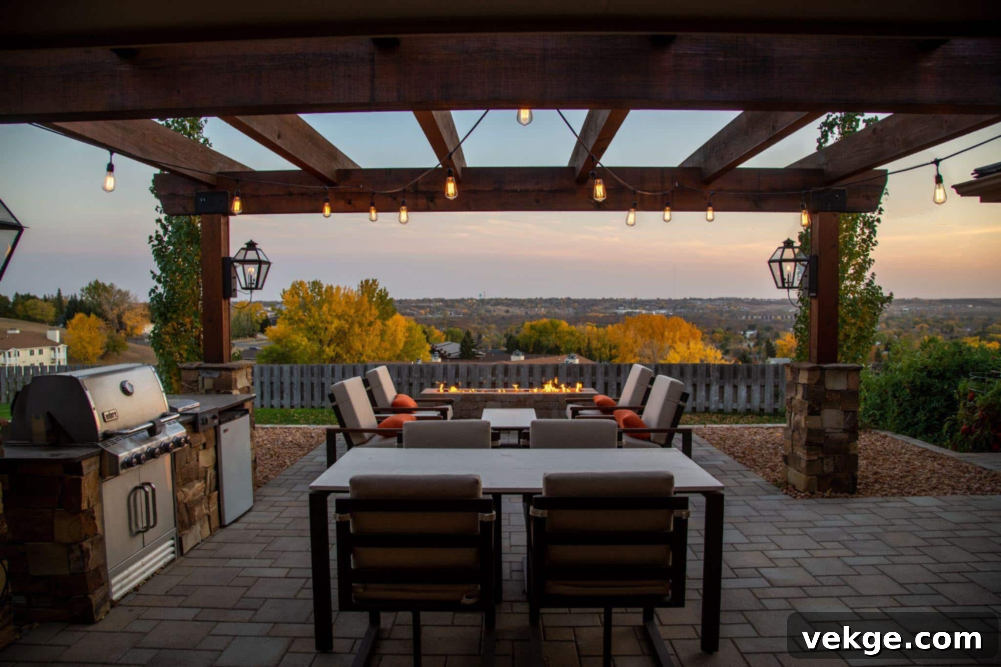 Patio with a kitchen and grill. 