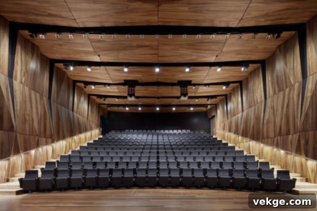 Spacious auditorium with wooden walls and ceiling