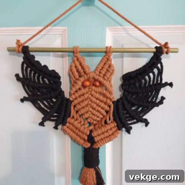 Dark macrame bat hanging as wall decoration