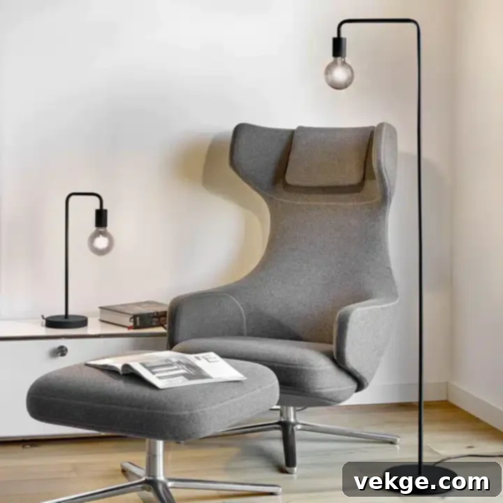 Scandinavian floor lamp illuminating a modern living room with its sleek design and warm glow, complementing the minimalist decor.