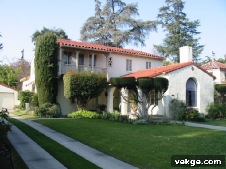 A versatile house featuring a red roof and white trim, blending elegance and charm