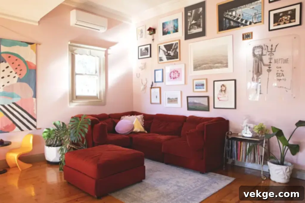 White walls making a red sofa the central focus in a modern living room