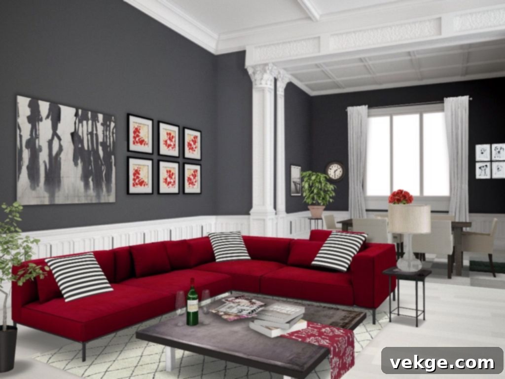 Gray walls providing a modern and sophisticated backdrop for a red sofa