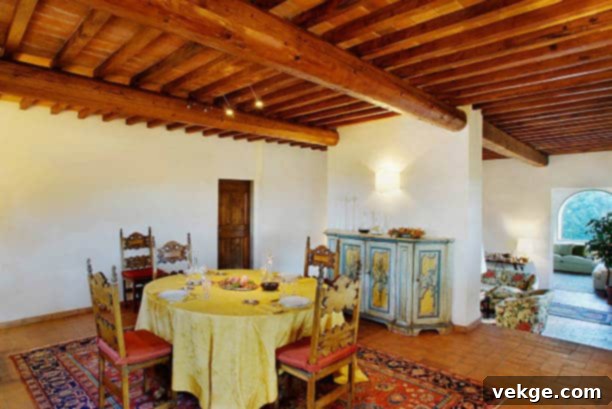 House Valle Bandina is located near Florence Tuscany Italy, featuring a stylish rug in the dining area.