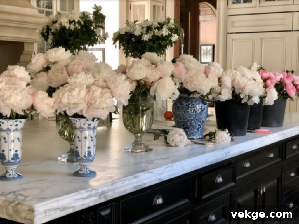 Lush pink peonies overflowing from an elegant white ginger jar, creating a luxurious and romantic centerpiece