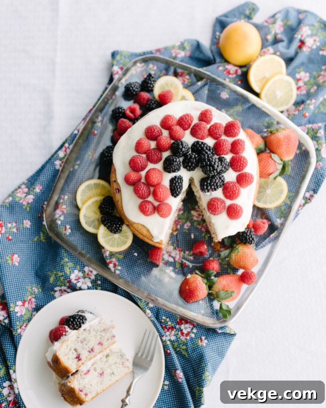Sunshine Raspberry Lemon Cake 2 Beautifully decorated Raspberry Lemon Cake with fresh raspberries and lemon slices
