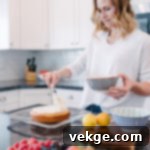 Sunshine Raspberry Lemon Cake 6 Top view of Raspberry Lemon Cake garnished with fresh fruit