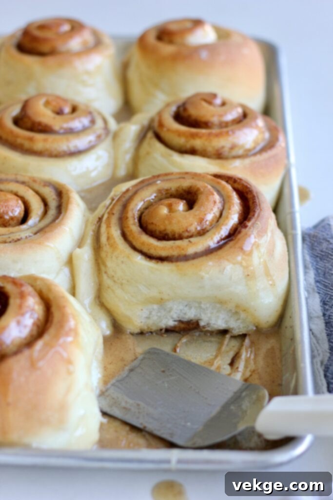 Giant Cinnamon Swirls with Golden Brown Butter Glaze 5 Freshly baked jumbo cinnamon rolls