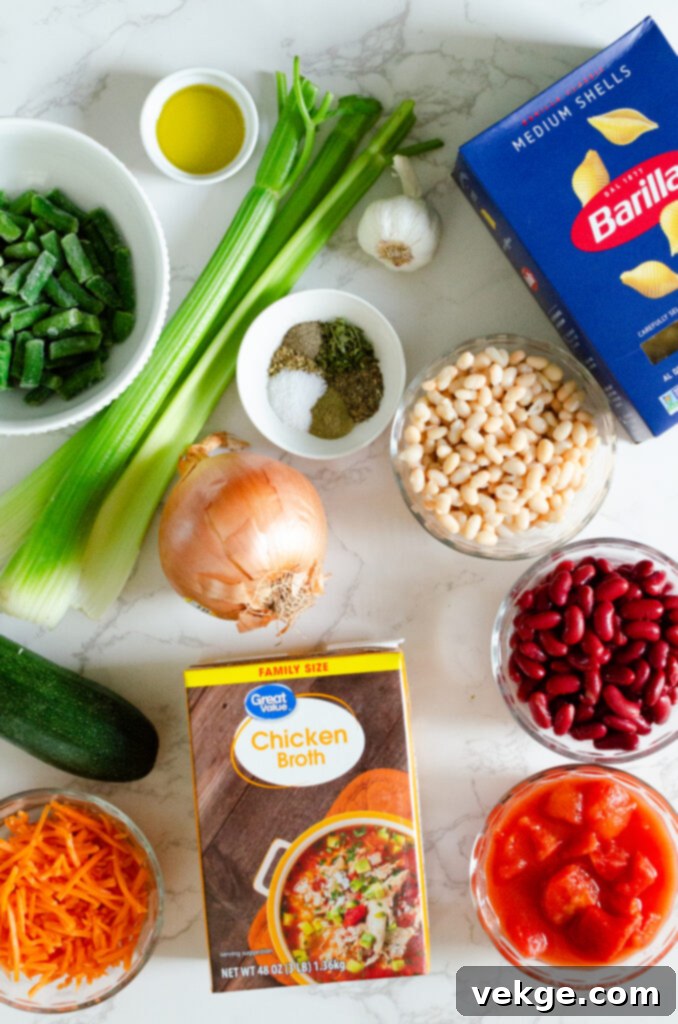 Effortless Instant Pot Minestrone 2 A steaming bowl of hearty Instant Pot Minestrone Soup, garnished with fresh herbs and Parmesan cheese, ready to be served with crusty bread.
