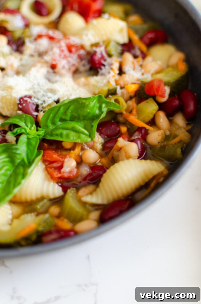 Effortless Instant Pot Minestrone 3 Close-up shot of the fresh ingredients for Minestrone Soup, including diced onions, garlic, celery, and carrots.