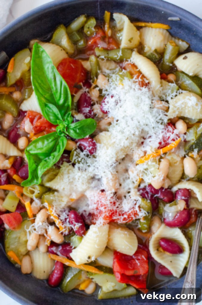 Effortless Instant Pot Minestrone 6 The Instant Pot displaying the 'COOK' status, indicating the Minestrone Soup is pressure cooking.