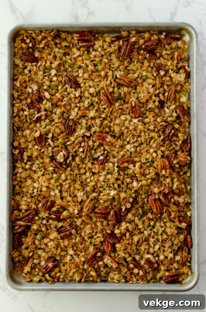 Cozy Cinnamon Granola 6 Crispy homemade cinnamon granola in a glass bowl