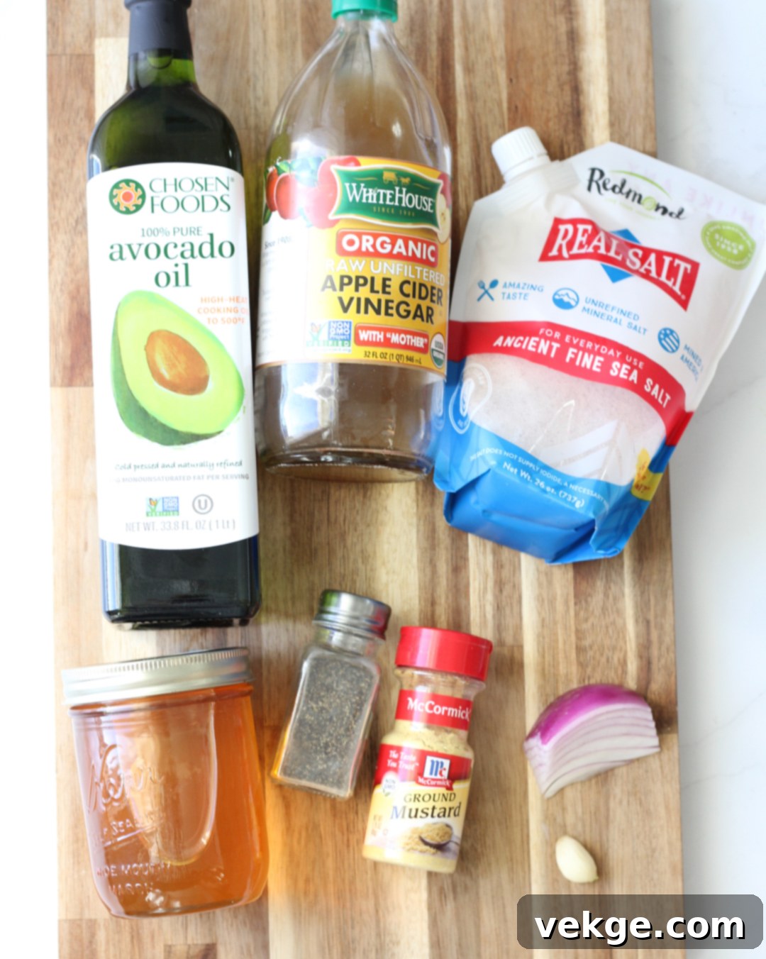 Crisp Apple, Smoky Bacon Salad 3 Bowl of fresh spinach, sliced strawberries, diced apples, and crispy bacon bits for a salad.