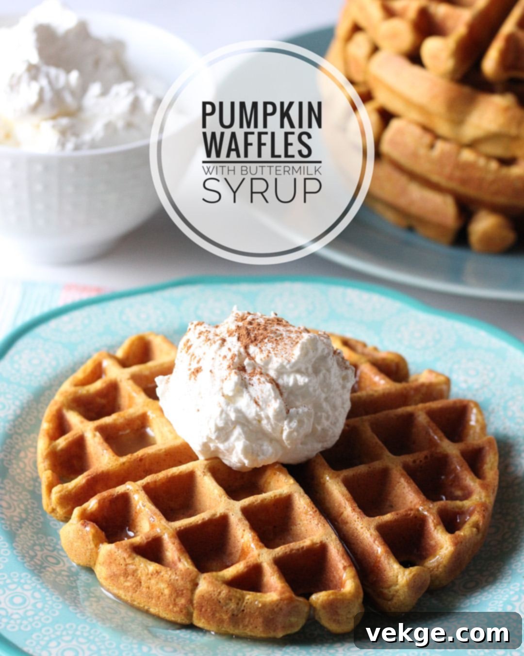 Golden Pumpkin Waffles with Creamy Buttermilk Syrup 3 A close-up shot of a golden-brown pumpkin waffle, steam gently rising, with a small jug of buttermilk syrup waiting to be poured.
