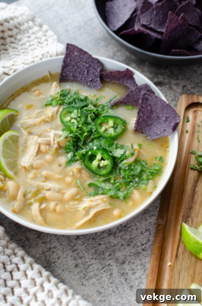 Creamy Instant Pot White Chicken Chili 7 A selection of three different soup bowls, showcasing various delicious soup recipes.