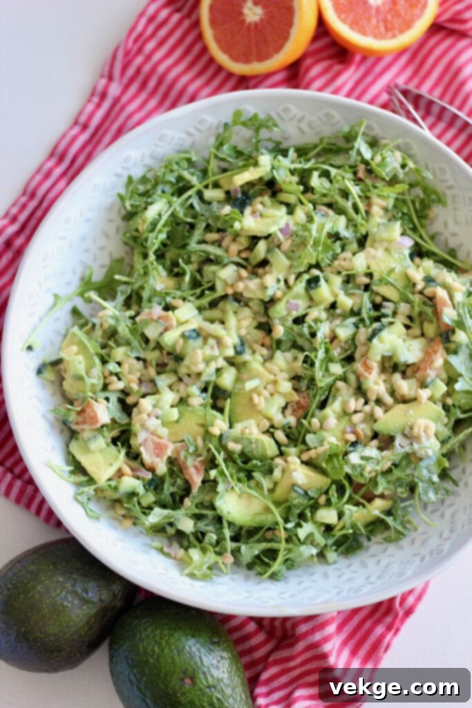 Vibrant Orange Avocado Salad with fresh ingredients