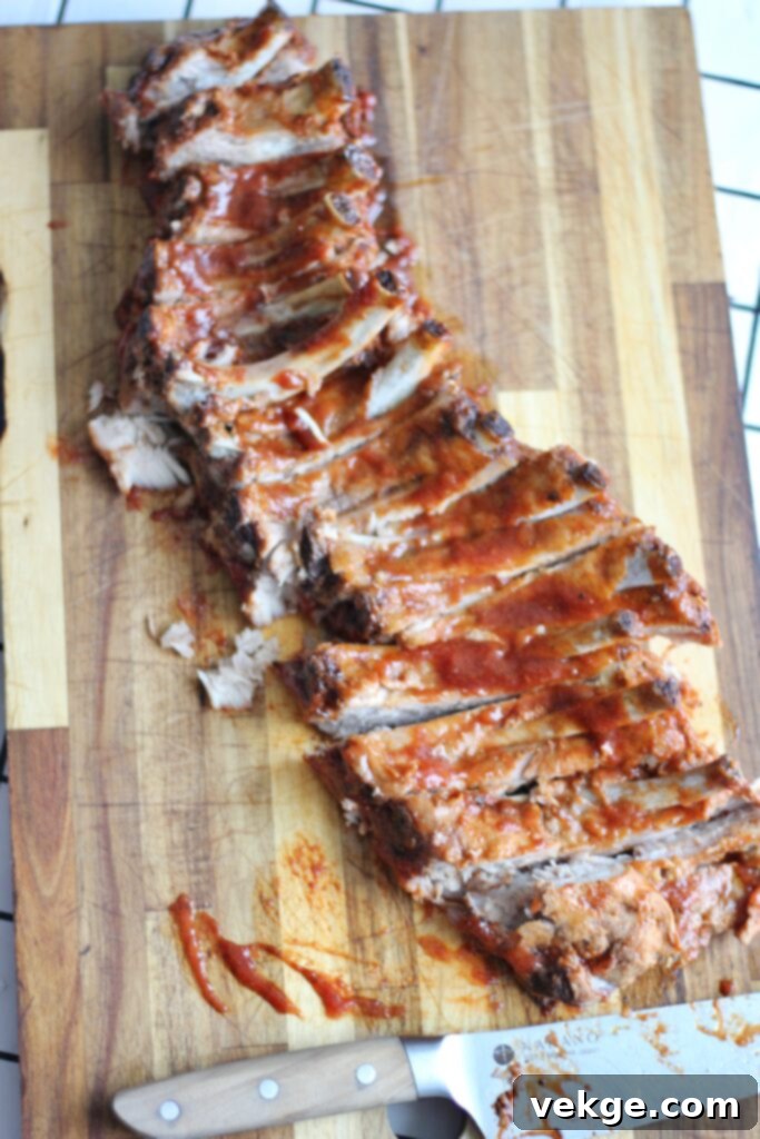Homemade barbecue sauce simmering in a saucepan.