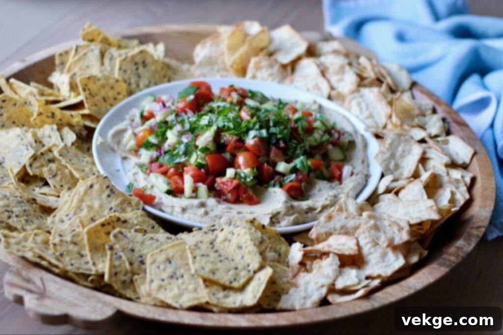 Vibrant Veggie Loaded Hummus Dip on a platter