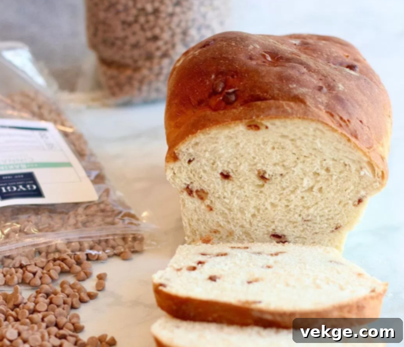 Cinnamon Swirl Bread 4 A beautifully risen and golden-brown loaf of homemade Cinnamon White Bread, ready to be enjoyed.