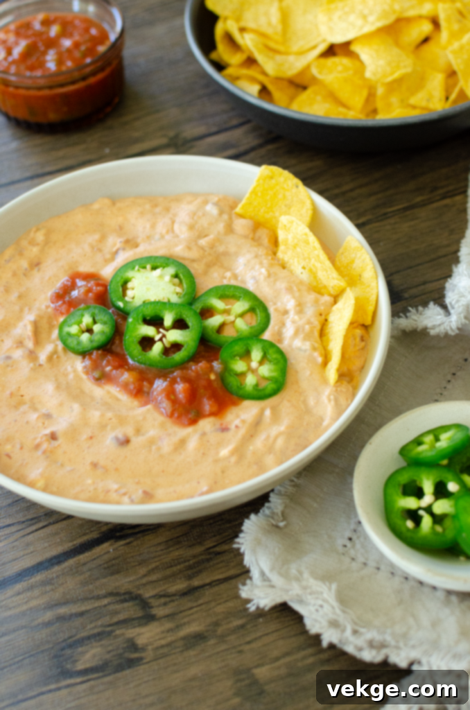 Jake's Signature Cream Cheese Bean Dip 5 Warm Cream Cheese Bean Dip served in a bowl