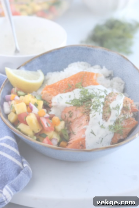 Wild Salmon Pineapple Burst Dill Finish 4 Plated salmon with salsa and rice